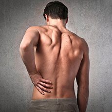 Man with low back pain Low back pain treated at the reading chiropractor