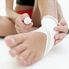 Women with bandaged ankle