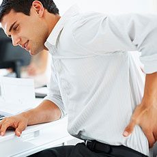 Back Pain Office man suffering back pain